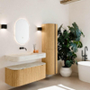 MONDIAZ THOR-DLUX 110cm badmeubel ronding links + rechts kleur Oak met 1 lade en 2 deuren. Vrijhangende wastafel CLOUD Midden zonder kraangat kleur Ostra. SW1462806