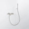 FortiFura Calvi Robinet de baignoire thermostatique avec douchette stick, support et flexible lisse Inox brossé PVD SW811957