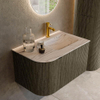 MONDIAZ KURVE-DLUX meuble de salle de bains 75 cm courbe à gauche couleur Shadow avec 1 tiroir et 1 porte. Lavabo GRUNNE à droite 1 trou de robinet Nata. SW1432275