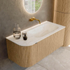 MONDIAZ KURVE-DLUX meuble de salle de bains 105 cm avec module 25 L couleur Oak avec 1 tiroir et 1 porte. Plan-vasque BIG SMALL à droite sans trou de robinetterie couleur Ostra. SW1137740