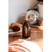 Wellmark Savon à mains verre marron pompe laiton 500ml texte QUE TOUS VOS SOUCIS SOIENT DES BULLES Étiquette noire SW454601