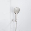 Fortifura Calvi Robinet de baignoire thermostatique avec douchette ronde, support et flexible métal Inox brossé PVD SW811980