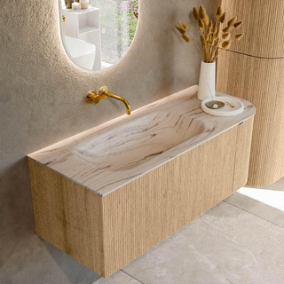 MONDIAZ KURVE-DLUX 115cm badmeubel ronding Rechts kleur Oak met 1 lade en 1 deur. Wastafel BIG SMALL Links zonder kraangat Nata.