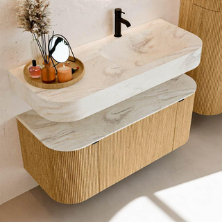 MONDIAZ THOR-DLUX 110cm badmeubel ronding links + rechts kleur Oak met 1 lade en 2 deuren. Vrijhangende wastafel CLOUD Rechts 1 kraangat kleur Ostra.