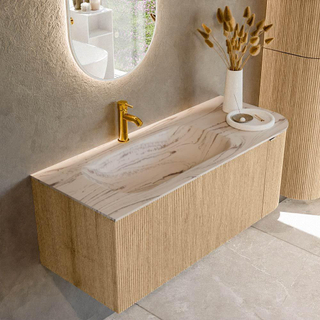 MONDIAZ KURVE-DLUX 115cm badmeubel ronding Rechts kleur Oak met 1 lade en 1 deur. Wastafel BIG SMALL Links 1 kraangat Nata.