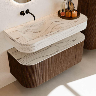 MONDIAZ THOR-DLUX 110cm badmeubel ronding links + rechts kleur Walnut met 1 lade en 2 deuren. Vrijhangende wastafel CLOUD Links zonder kraangat kleur Nata.