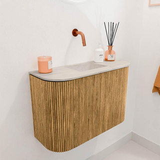 Mondiaz JOYA-DLUX 63.2cm toiletmeubel - ronding links en rechts kleur Oak - Wastafel FAYE positie Midden Zonder kraangat kleur Ostra.