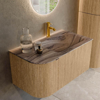 MONDIAZ KURVE-DLUX 85cm badmeubel ronding Links kleur Oak met 1 lade en 1 deur. Wastafel CLOUD Rechts 1 kraangat Sombra.