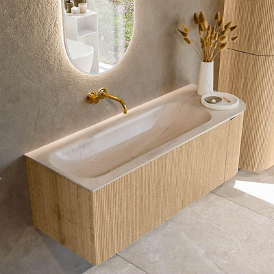 MONDIAZ KURVE-DLUX Meuble de salle de bains 125cm arrondi à droite couleur chêne avec 1 tiroir et 1 porte. Plan-vasque BIG MEDIUM à gauche sans trou de robinet Meli.