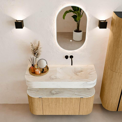 MONDIAZ THOR-DLUX 110cm badmeubel ronding links + rechts kleur Oak met 1 lade en 2 deuren. Vrijhangende wastafel CLOUD Rechts zonder kraangat kleur Ostra.