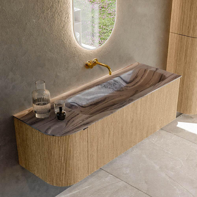 MONDIAZ KURVE-DLUX Meuble de salle de bains 135cm arrondi à gauche couleur chêne avec 1 tiroir et 1 porte. Lavabo BIG MEDIUM à droite sans trou de robinetterie Sombra.