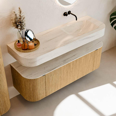 MONDIAZ THOR-DLUX 140cm badmeubel ronding links + rechts kleur Oak met 1 lade en 2 deuren. Vrijhangende wastafel CLOUD Rechts zonder kraangat kleur Meli.