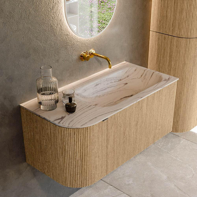 MONDIAZ KURVE-DLUX Meuble de salle de bains 95cm arrondi à gauche couleur Chêne avec 1 tiroir et 1 porte. Lavabo BIG SMALL à droite sans trou de robinet Nata.