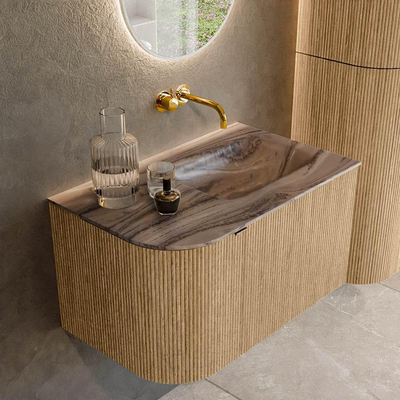 MONDIAZ KURVE-DLUX Meuble de salle de bains 75cm arrondi gauche couleur Oak avec 1 tiroir et 1 porte. Lavabo GRUNNE à droite sans trou de robinet Sombra.