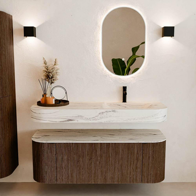 MONDIAZ THOR-DLUX 130cm badmeubel ronding links + rechts kleur Walnut met 1 lade en 2 deuren. Vrijhangende wastafel CLOUD Rechts 1 kraangat kleur Nata.