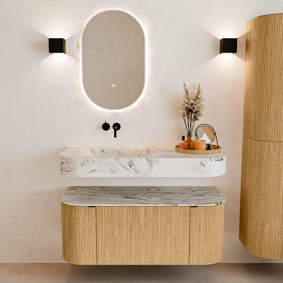 MONDIAZ THOR-DLUX 110cm badmeubel ronding links + rechts kleur Oak met 1 lade en 2 deuren. Vrijhangende wastafel CLOUD Links zonder kraangat kleur Glace.