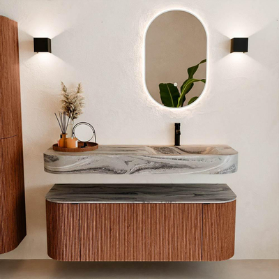 MONDIAZ THOR-DLUX 130cm badmeubel ronding links + rechts kleur Ruby met 1 lade en 2 deuren. Vrijhangende wastafel CLOUD Rechts 1 kraangat kleur Sombra.
