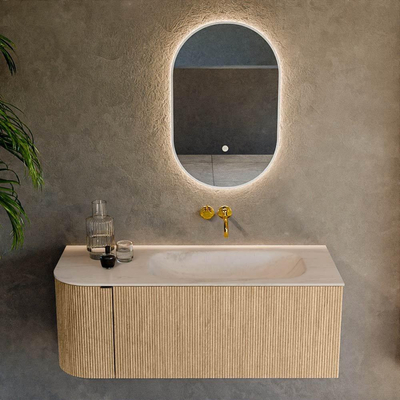 MONDIAZ KURVE-DLUX meuble de salle de bains 115cm arrondi à gauche couleur chêne avec 1 tiroir et 1 porte. Plan-vasque BIG SMALL à droite sans trou de robinet Meli.