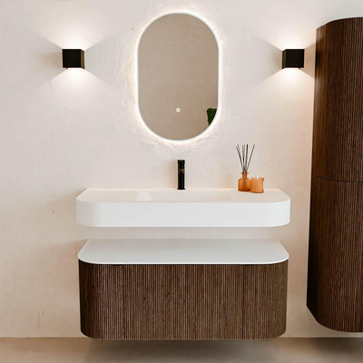 MONDIAZ THOR Meuble de salle de bains 110cm arrondi gauche + droite couleur Walnut avec 1 tiroir et 2 portes. Vasque suspendue CLOUD Milieu 1 trou de robinet couleur Talc.