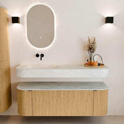 MONDIAZ THOR-DLUX 140cm badmeubel ronding links + rechts kleur Oak met 1 lade en 2 deuren. Vrijhangende wastafel CLOUD Links zonder kraangat kleur Opalo.