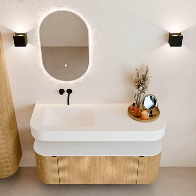 MONDIAZ THOR 130cm badmeubel ronding links + rechts kleur Oak met 1 lade en 2 deuren. Vrijhangende wastafel CLOUD Links zonder kraangat kleur Talc.