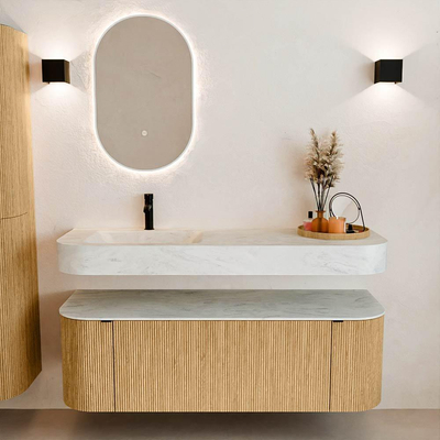 MONDIAZ THOR-DLUX 140cm badmeubel ronding links + rechts kleur Oak met 1 lade en 2 deuren. Vrijhangende wastafel CLOUD Links 1 kraangat kleur Opalo.