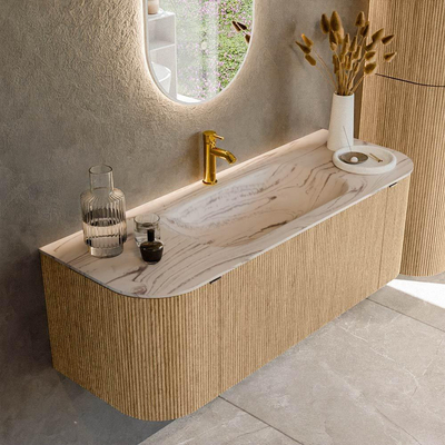 MONDIAZ KURVE-DLUX 130cm badmeubel ronding Links + Rechts kleur Oak met 1 lade en 2 deuren. Wastafel BIG SMALL Midden 1 kraangat Nata.
