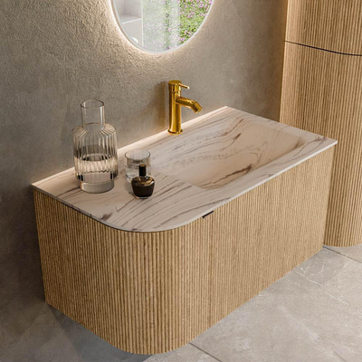 MONDIAZ KURVE-DLUX 85cm badmeubel ronding Links kleur Oak met 1 lade en 1 deur. Wastafel CLOUD Rechts 1 kraangat Nata.