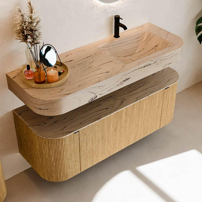 MONDIAZ THOR-DLUX 130cm badmeubel ronding links + rechts kleur Oak met 1 lade en 2 deuren. Vrijhangende wastafel CLOUD Rechts 1 kraangat kleur Arena.