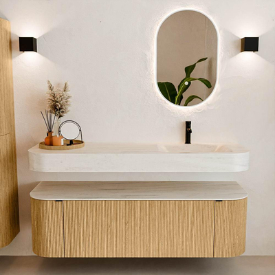 MONDIAZ THOR-DLUX 150cm badmeubel ronding links + rechts kleur Oak met 1 lade en 2 deuren. Vrijhangende wastafel CLOUD Rechts 1 kraangat kleur Meli.