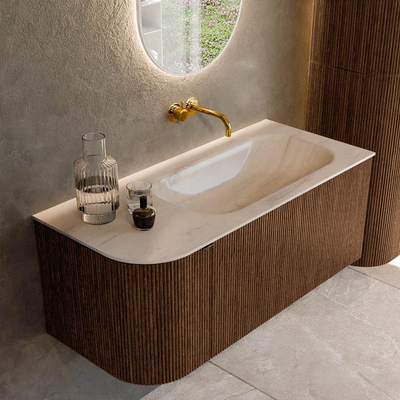 MONDIAZ KURVE-DLUX 105cm badmeubel ronding Links kleur Walnut met 1 lade en 1 deur. Wastafel BIG SMALL Rechts zonder kraangat Meli.