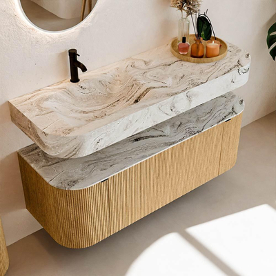 MONDIAZ THOR-DLUX 130cm badmeubel ronding links + rechts kleur Oak met 1 lade en 2 deuren. Vrijhangende wastafel CLOUD Links 1 kraangat kleur Glace.