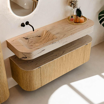 MONDIAZ THOR-DLUX 140cm badmeubel ronding links + rechts kleur Oak met 1 lade en 2 deuren. Vrijhangende wastafel CLOUD Links zonder kraangat kleur Arena.