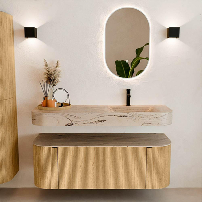 MONDIAZ THOR-DLUX 130cm badmeubel ronding links + rechts kleur Oak met 1 lade en 2 deuren. Vrijhangende wastafel CLOUD Rechts 1 kraangat kleur Arena.