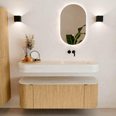 MONDIAZ THOR-DLUX 130cm badmeubel ronding links + rechts kleur Oak met 1 lade en 2 deuren. Vrijhangende wastafel CLOUD Rechts zonder kraangat kleur Meli.