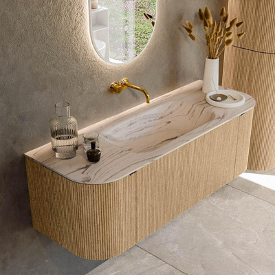 MONDIAZ KURVE-DLUX 130cm badmeubel ronding Links + Rechts kleur Oak met 1 lade en 2 deuren. Wastafel BIG SMALL Midden zonder kraangat Nata.