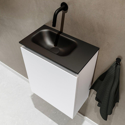 MONDIAZ TURE Toiletmeubel 40x23x50cm met 0 kraangaten 1 deuren talc mat Wastafel Eden links Solid Surface Zwart
