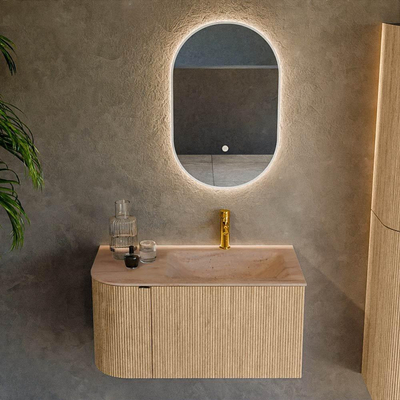 MONDIAZ KURVE-DLUX 85cm badmeubel ronding Links kleur Oak met 1 lade en 1 deur. Wastafel CLOUD Rechts 1 kraangat Saba.