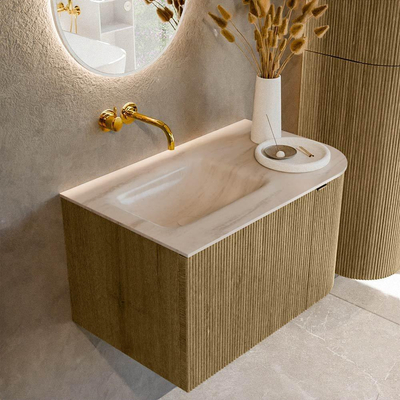 MONDIAZ KURVE-DLUX Meuble de salle de bains 75cm arrondi à droite couleur Dusk avec 1 tiroir et 1 porte. Lavabo GRUNNE à gauche sans trou de robinet Meli.