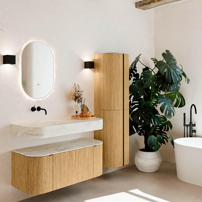 MONDIAZ THOR-DLUX 110cm badmeubel ronding links + rechts kleur Oak met 1 lade en 2 deuren. Vrijhangende wastafel CLOUD Links zonder kraangat kleur Ostra.