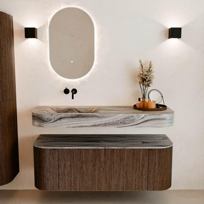 MONDIAZ THOR-DLUX 130cm badmeubel ronding links + rechts kleur Walnut met 1 lade en 2 deuren. Vrijhangende wastafel CLOUD Links zonder kraangat kleur Sombra.