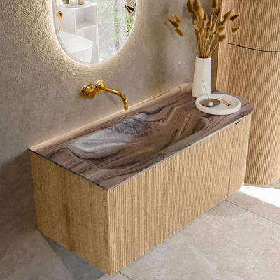 MONDIAZ KURVE-DLUX 105cm badmeubel ronding Rechts kleur Oak met 1 lade en 1 deur. Wastafel BIG SMALL Links zonder kraangat Sombra.