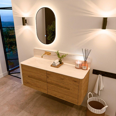 Mondiaz CIRO-DLUX Meuble de salle de bains - 130x45x50cm - Plan vasque solid surface Meli - 1 vasque à gauche - sans trous de robinet - 4 tiroirs - Chêne