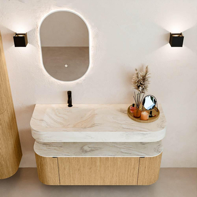 MONDIAZ THOR-DLUX 130cm badmeubel ronding links + rechts kleur Oak met 1 lade en 2 deuren. Vrijhangende wastafel CLOUD Links 1 kraangat kleur Ostra.