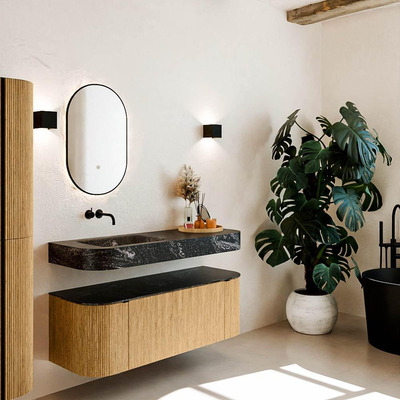 MONDIAZ THOR-DLUX 130cm badmeubel ronding links + rechts kleur Oak met 1 lade en 2 deuren. Vrijhangende wastafel CLOUD Links zonder kraangat kleur Lava.