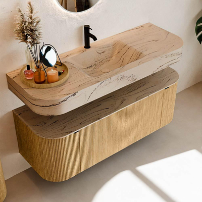 MONDIAZ THOR-DLUX 130cm badmeubel ronding links + rechts kleur Oak met 1 lade en 2 deuren. Vrijhangende wastafel CLOUD Midden 1 kraangat kleur Arena.