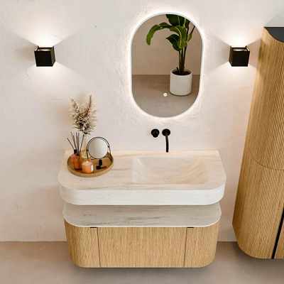 MONDIAZ THOR-DLUX 110cm badmeubel ronding links + rechts kleur Oak met 1 lade en 2 deuren. Vrijhangende wastafel CLOUD Rechts zonder kraangat kleur Meli.