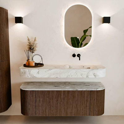 MONDIAZ THOR-DLUX 130cm badmeubel ronding links + rechts kleur Walnut met 1 lade en 2 deuren. Vrijhangende wastafel CLOUD Rechts zonder kraangat kleur Glace.