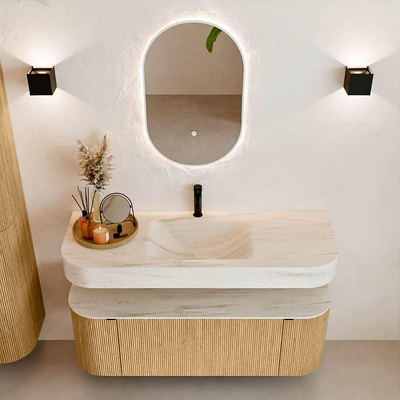 MONDIAZ THOR-DLUX 130cm badmeubel ronding links + rechts kleur Oak met 1 lade en 2 deuren. Vrijhangende wastafel CLOUD Midden 1 kraangat kleur Meli.