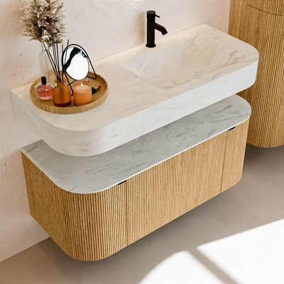 MONDIAZ THOR-DLUX 110cm badmeubel ronding links + rechts kleur Oak met 1 lade en 2 deuren. Vrijhangende wastafel CLOUD Rechts 1 kraangat kleur Opalo.